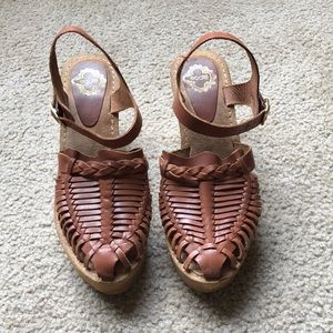 Brown woven clogs